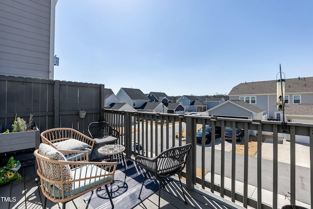 wooden deck featuring a residential view