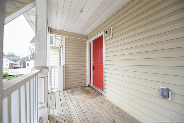 entrance to property featuring a balcony