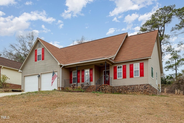 view of front of house featuring a front yard, roof with shingles, covered porch, a garage, and driveway