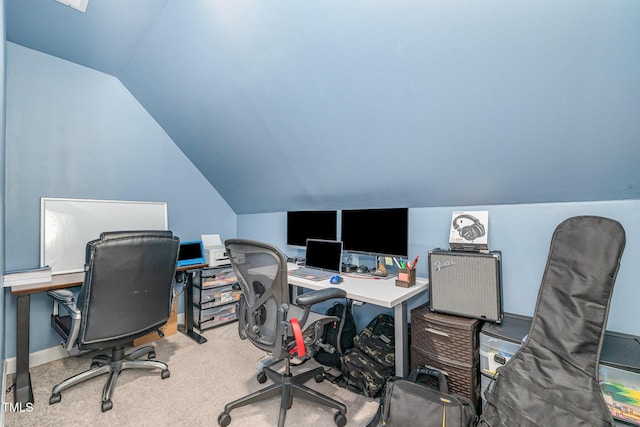 office featuring vaulted ceiling, baseboards, and carpet floors