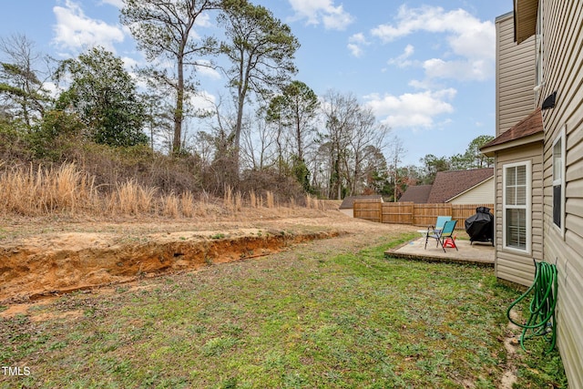 view of yard with a patio area and fence