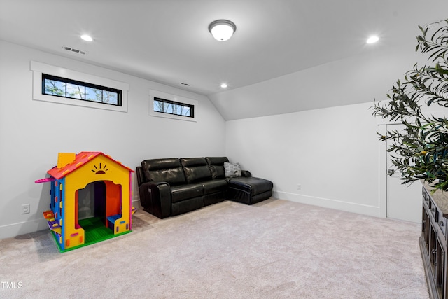 rec room featuring carpet, visible vents, baseboards, recessed lighting, and vaulted ceiling