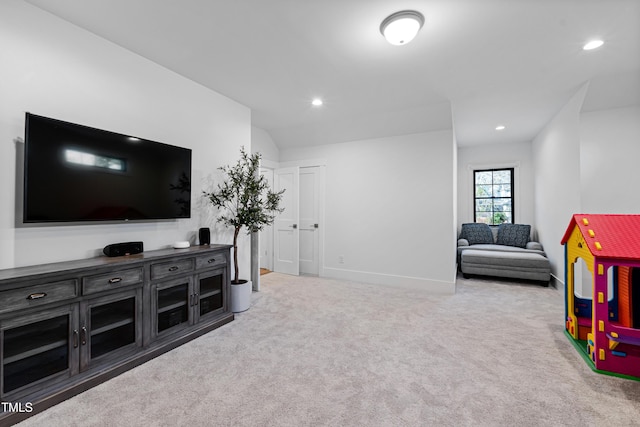 carpeted living room featuring recessed lighting and baseboards