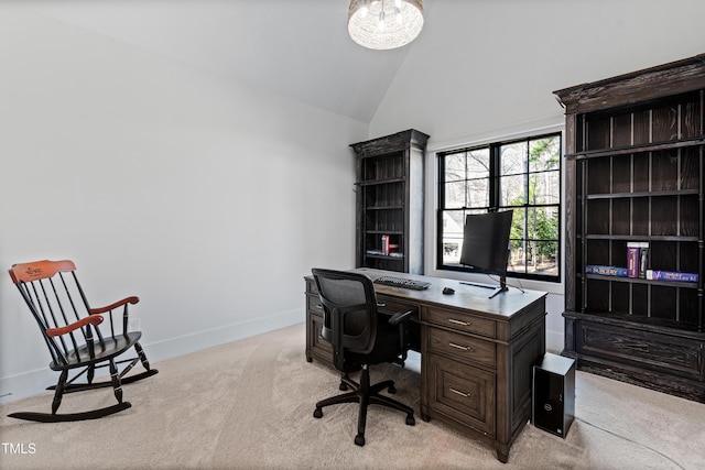 office area with light carpet, high vaulted ceiling, and baseboards