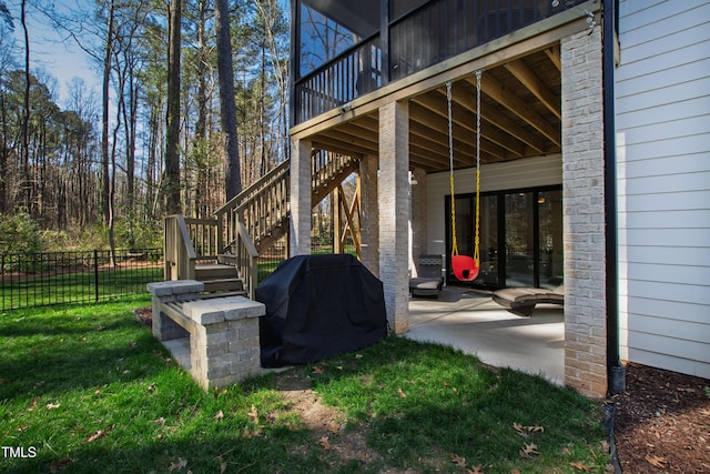 exterior space with stairs, a patio area, and fence