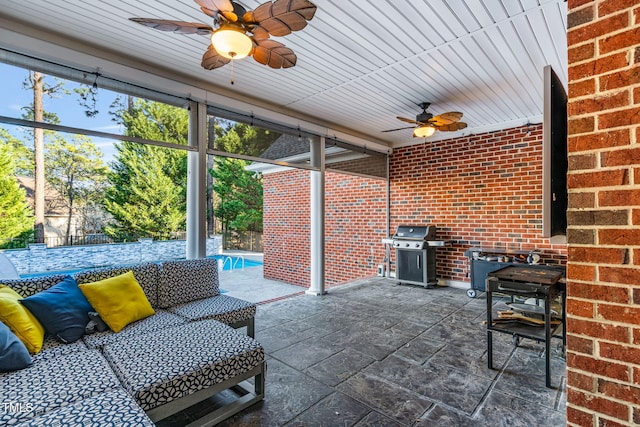 view of patio / terrace with a grill, ceiling fan, and fence