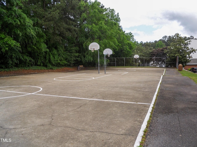 view of sport court with community basketball court and fence