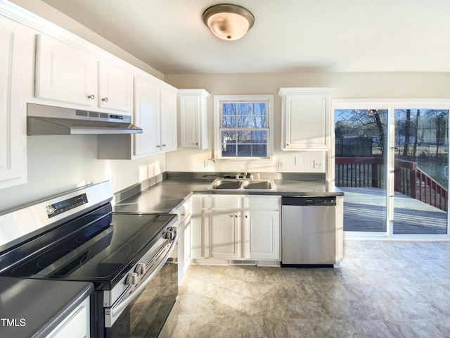 1125 Field Meadows Dr, Zebulon, NC 27597 - kitchen featuring visible vents, a sink, stainless steel appliances, white cabinets, and under cabinet range hood
