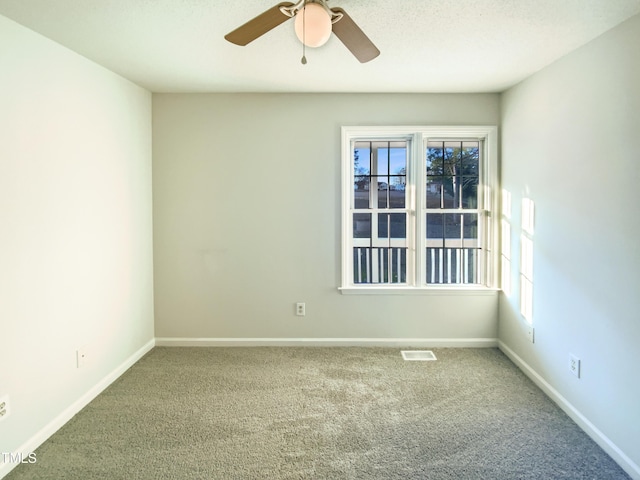 1125 Field Meadows Dr, Zebulon, NC 27597 - carpeted empty room with visible vents, baseboards, and ceiling fan