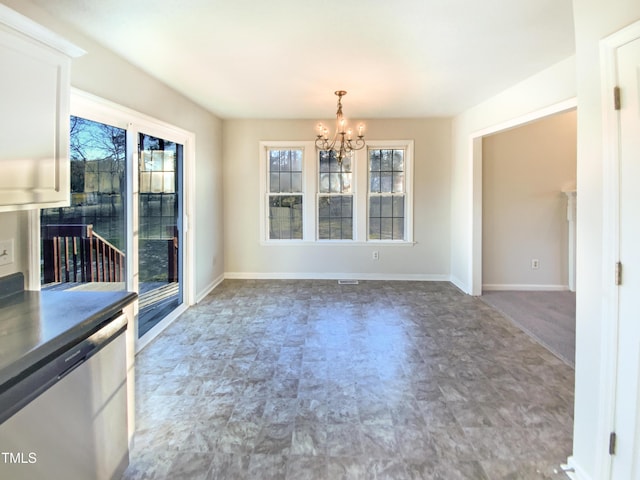 1125 Field Meadows Dr, Zebulon, NC 27597 - unfurnished dining area featuring baseboards and a chandelier