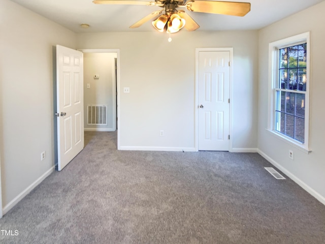 1125 Field Meadows Dr, Zebulon, NC 27597 - unfurnished bedroom with visible vents, baseboards, and carpet flooring