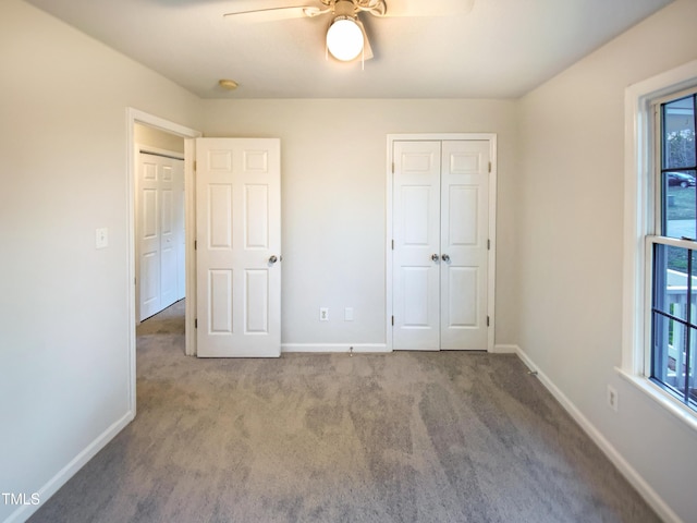 1125 Field Meadows Dr, Zebulon, NC 27597 - unfurnished bedroom featuring a closet, carpet flooring, ceiling fan, and baseboards