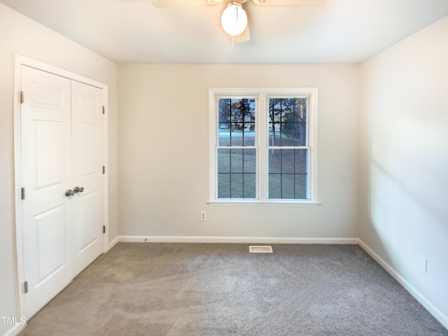1125 Field Meadows Dr, Zebulon, NC 27597 - carpeted empty room with visible vents, baseboards, and ceiling fan