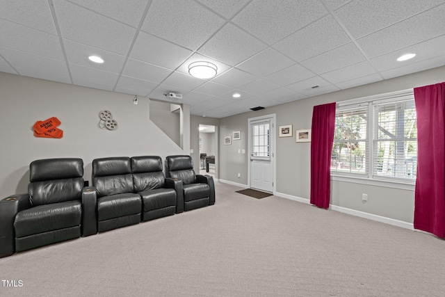 cinema room featuring recessed lighting, a drop ceiling, baseboards, and carpet floors