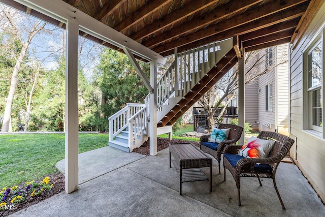 view of patio featuring an outdoor hangout area and stairs