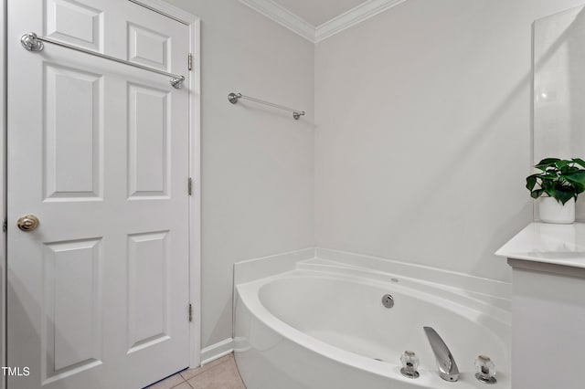 bathroom featuring tile patterned flooring, a garden tub, and ornamental molding