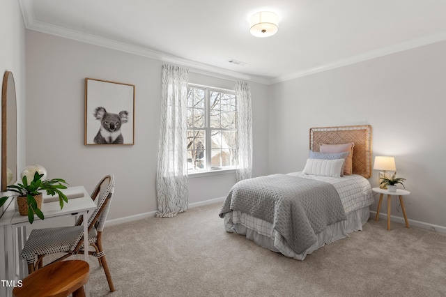 carpeted bedroom featuring crown molding and baseboards