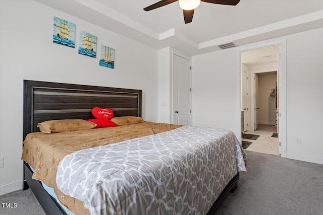 bedroom with visible vents, baseboards, carpet, and ceiling fan