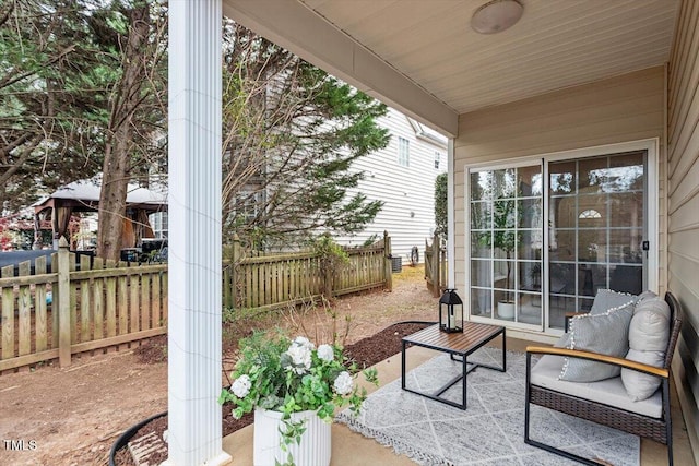 view of patio / terrace with fence