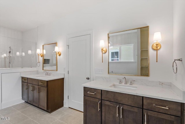 1608 Scales St, Raleigh, NC 27608 - full bathroom featuring tile patterned floors, two vanities, and a tile shower