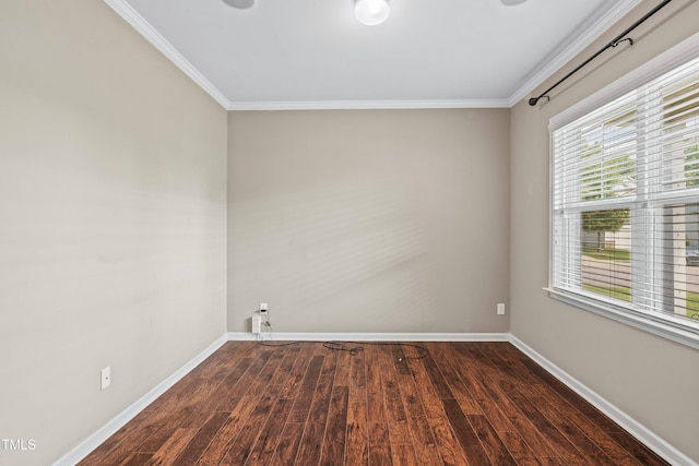 unfurnished room featuring dark wood-style floors, baseboards, and ornamental molding