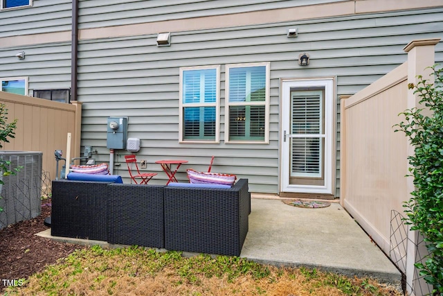 view of patio featuring an outdoor living space and central air condition unit