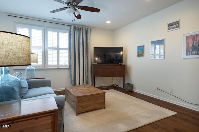 living area with visible vents, a ceiling fan, wood finished floors, recessed lighting, and baseboards