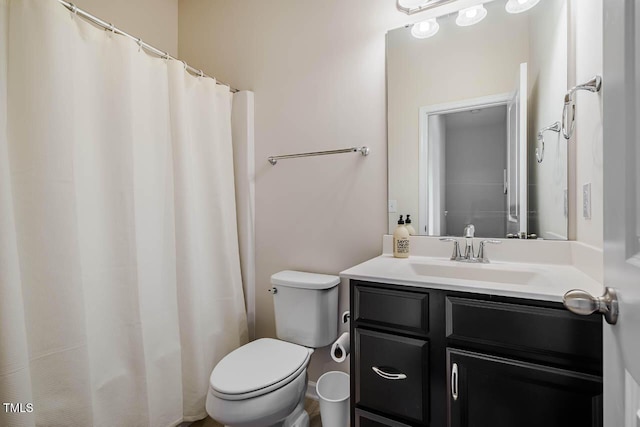 full bath with vanity and toilet