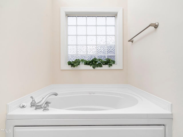 full bath with a garden tub