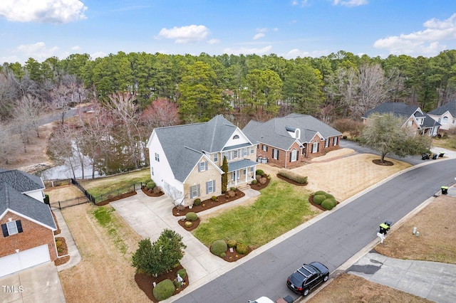 aerial view with a wooded view