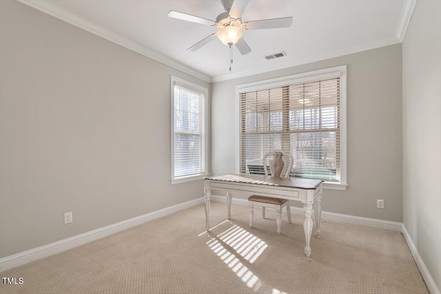 office area featuring light carpet, visible vents, crown molding, and baseboards