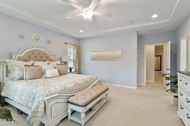 bedroom featuring baseboards, light colored carpet, a tray ceiling, recessed lighting, and a ceiling fan