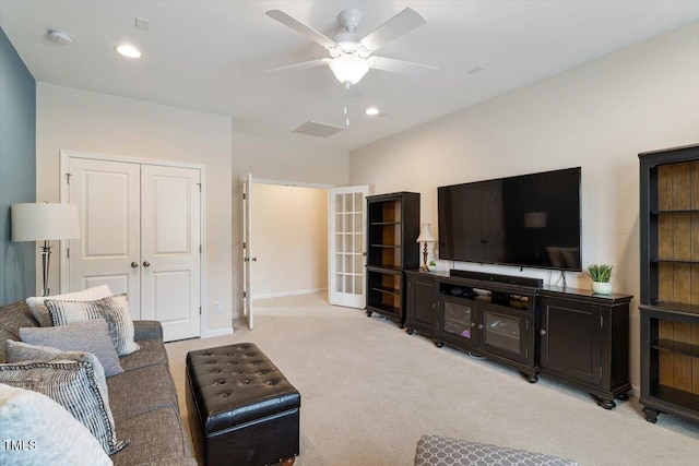 living area with visible vents, recessed lighting, carpet, baseboards, and ceiling fan