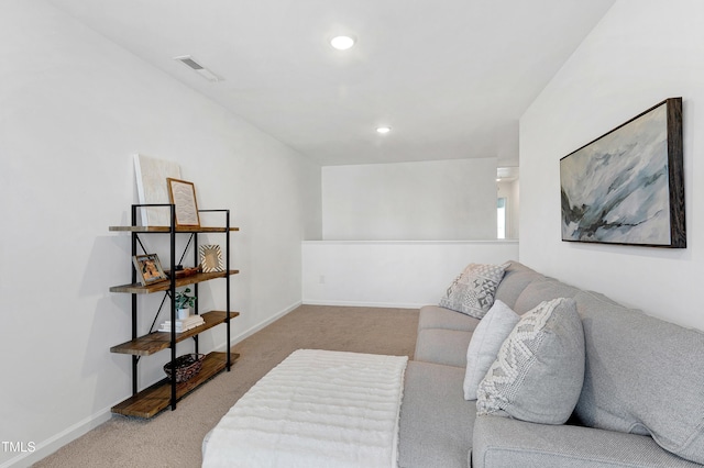 living room with visible vents, recessed lighting, baseboards, and carpet