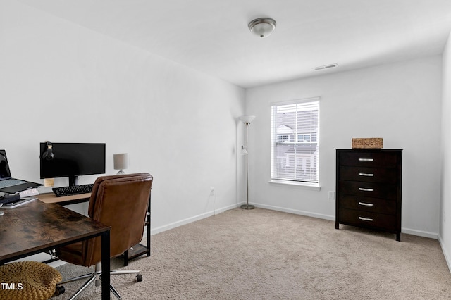 office area featuring carpet, visible vents, and baseboards