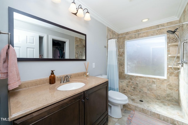 bathroom featuring vanity, toilet, a shower stall, and crown molding