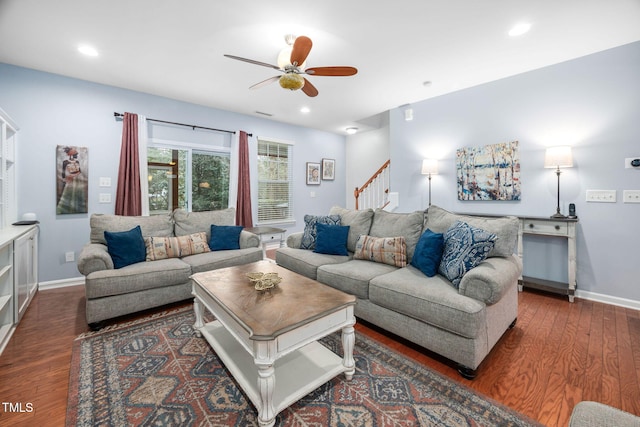 living area featuring recessed lighting, wood finished floors, and baseboards