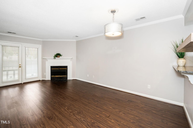 unfurnished living room featuring visible vents, baseboards, dark wood-style floors, and ornamental molding