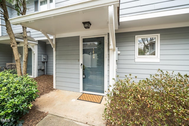 doorway to property featuring a porch