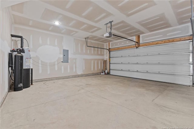 garage with electric panel and a garage door opener