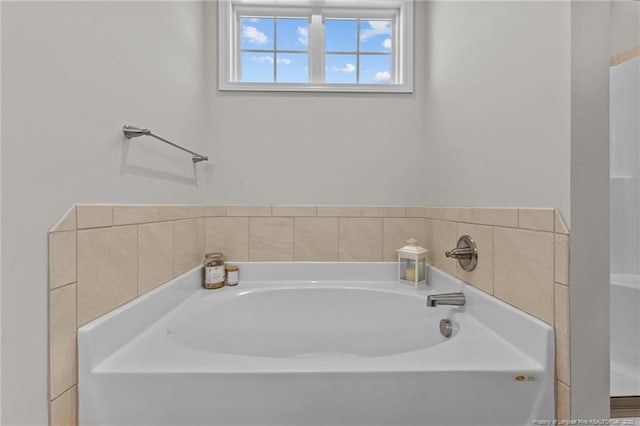 bathroom with a garden tub