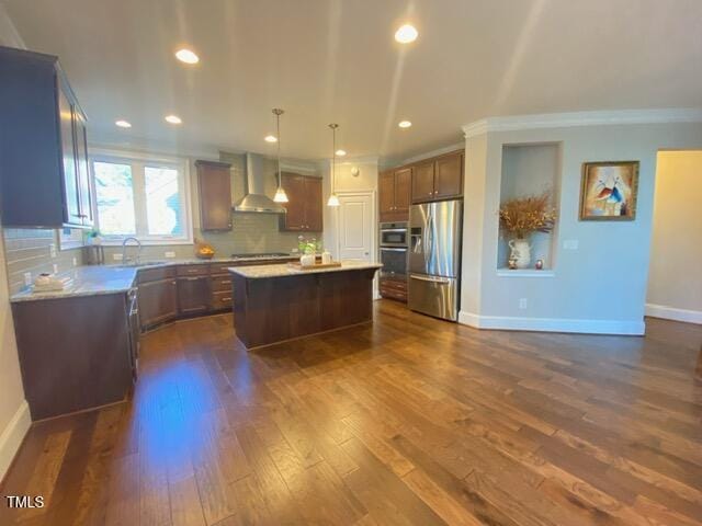 kitchen with a center island, wall chimney range hood, decorative backsplash, stainless steel refrigerator with ice dispenser, and dark wood-style flooring