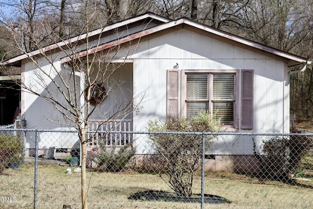 view of property exterior with fence and crawl space