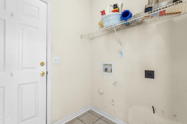 washroom featuring light tile patterned floors, baseboards, hookup for an electric dryer, laundry area, and washer hookup