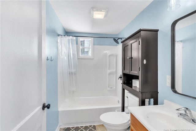 full bath with toilet, vanity, and shower / bath combination with curtain