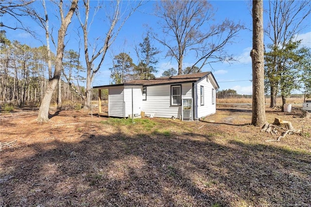 exterior space featuring an outbuilding