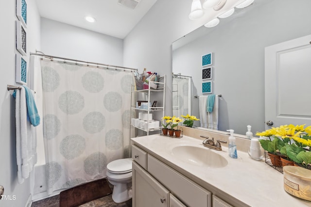 full bathroom featuring visible vents, shower / bath combo with shower curtain, toilet, and vanity