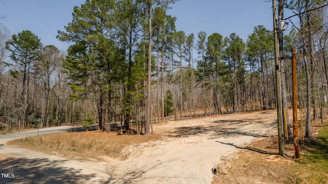 15 Bourbon St, Fuquay Varina, NC 27526 - view of street featuring a forest view