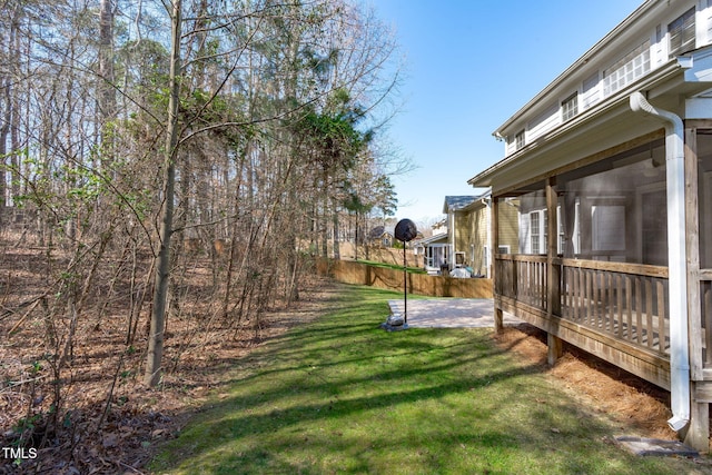 view of yard with a sunroom