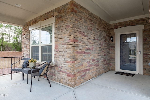 property entrance featuring covered porch